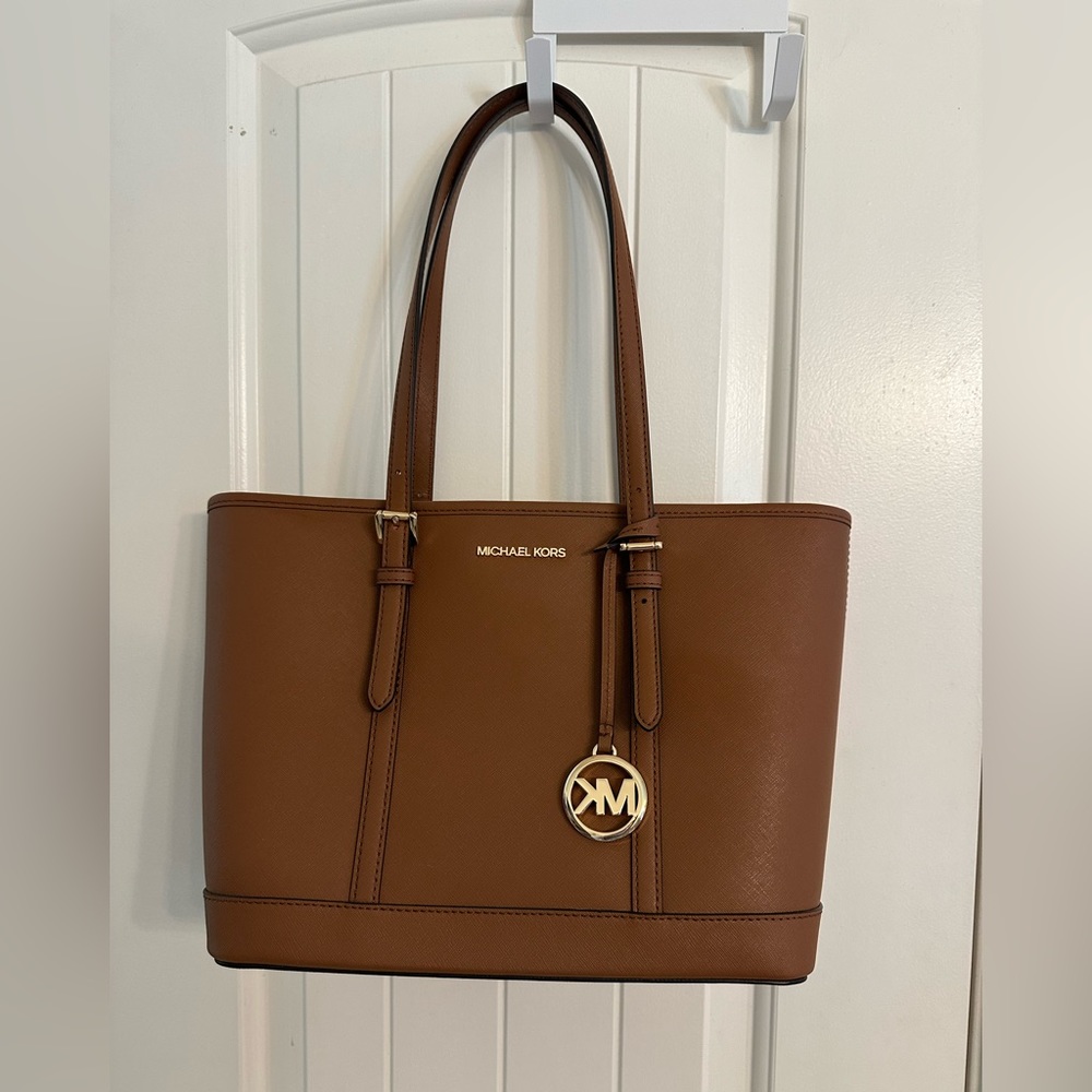 Jet Set Travel Large Saffiano MK brown bag
